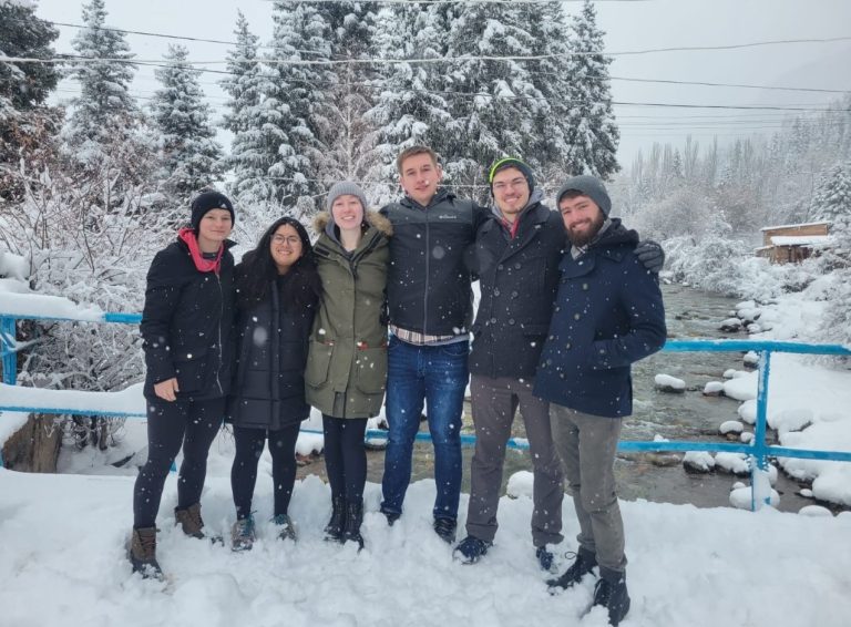 Russian Flagship student Torres Giraldo (second from left) with friends in a snowy Kyrgyzstan.