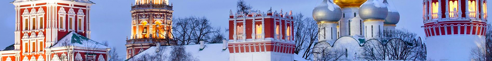 This image features the distinctive red and white Naprudnaya Tower and the adjacent fortifications of the Novodevichy Convent in Moscow, Russia.