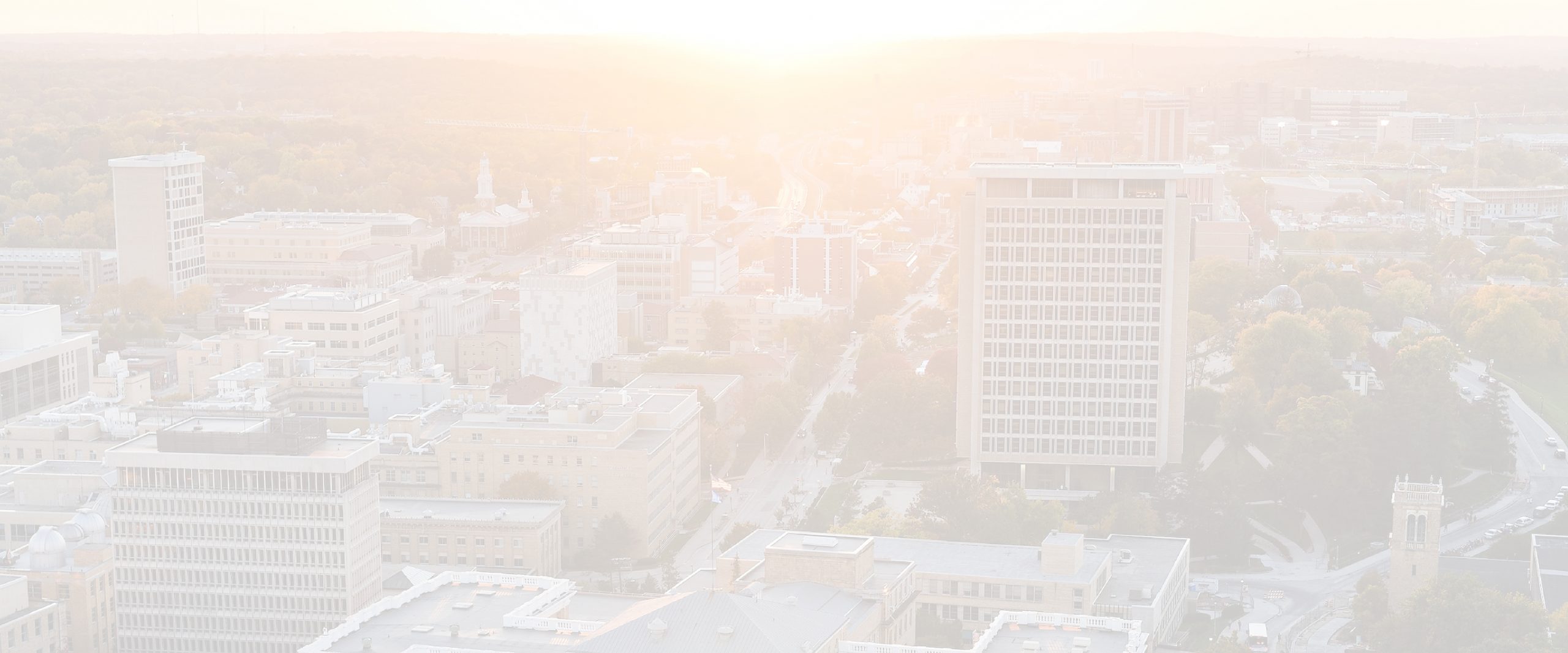 Background image of Madison, Wisconsin, including Van Hise.