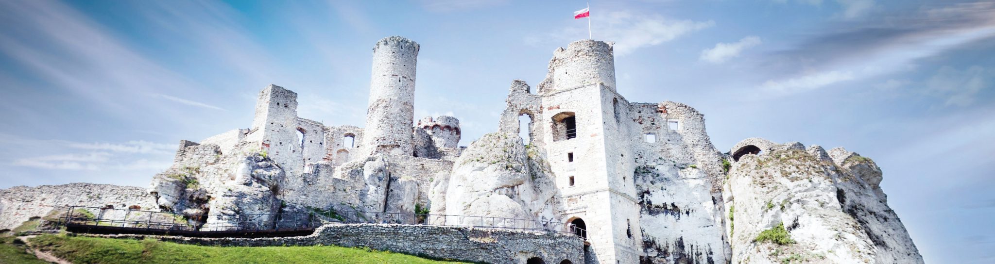 A photo of the Ogrodzieniec Castle ruins located in Podzamcze, Poland.