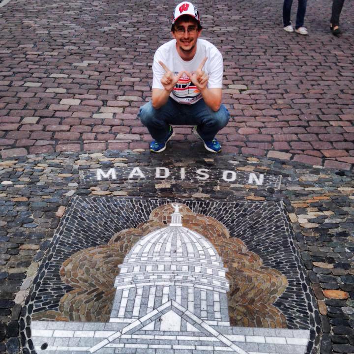 UW-Madison Grad student Chris Tabisz throwing the "W" at Madison's sister city in Freiburg, Germany.