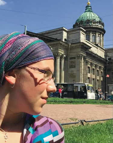 image of study abroad alumna Nora Herzog outside the Kasanskii Sabor (Kasan Cathedral) in St. Petersburg.