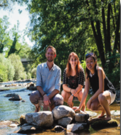 image of study abroad alum Elliott Frokjer with fellow Badgers exploring the Dreisam River.