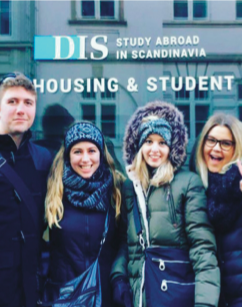 image of study abroad alumna Nicole Gregorich (second from the left) and three other DIS students on a scavenger hunt during their first week in Copenhagen.