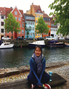 image of study abroad alumna Yao Liu along the water in Copenhagen.