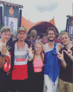 image of study abroad alum James Rasmussen (right) and fellow Badgers at Northern Europe's largest music festival.