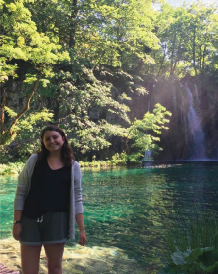 image of study abroad alumna Melanie Rogers at Plitvice Lakes National Park, where there are stunning waterfalls.