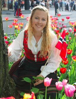 image of study abroad alumna Alexis Dunnum, enjoying Norway's Constitution Day in Oslo.